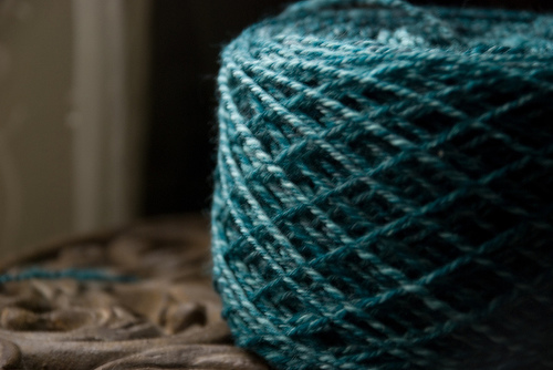 Soft Focus Handspun Yarn Cake in Natural Light