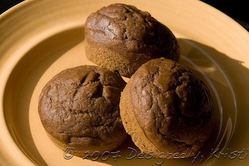 Pumpkin Molasses Muffins on a Yellow Plate