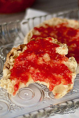 Low-Sugar Raspberry Peach Jam on An English Muffin