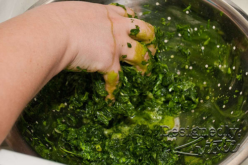 Bruise and Drain Spinach Mixed with Salt