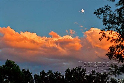 Sunlit Clouds with Moon