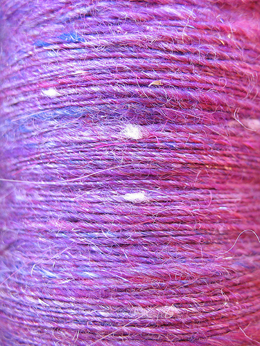 Purple Handspun Singles on Bobbin