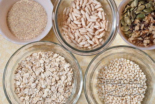 Dry Granola Ingredients - Oats, Puffed Brown Rice and Millet, Wheat Germ, Walnuts and Pumpkin Seeds