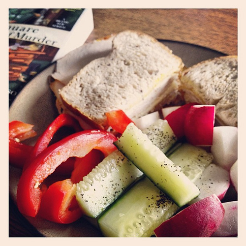 Quick lunch today because I have yoga tonight. It was still yummy! Turkey, cheddar and mustard on sprouted organic whole grain bread with radishes, cucumber and red pepper with a side of 2 chapters of The Square Root of Murder.