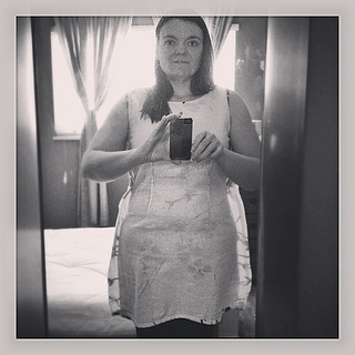 Tailoring an XL linen dress I bought in 1999 when I move to Fort Collins. I took off about 4"!