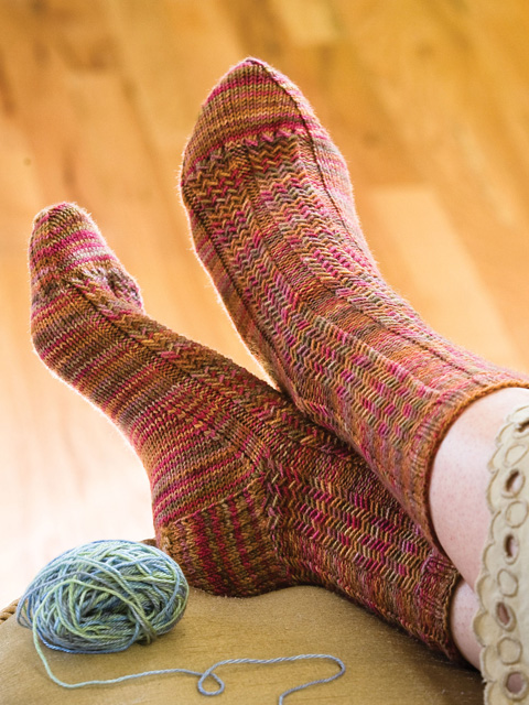 © Interweave Press, Herringbone Rib Socks from Knitting Socks with Handpainted Yarns, used with permission.