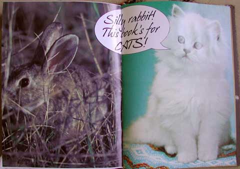 Kristi spoofs Trix cereal in this altered book spread in Nancy's cat altered book for the Stampsmith Altered Book Exchange.