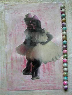 Detail of the vintage photograph and beads used in this simple, yet rich art journal page.