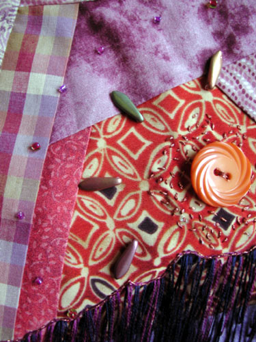 A detail of the spread near the button sun.