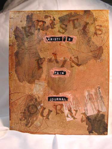 Kristi's cover of her coptic stitched pain journal.