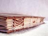 View this copitc bound blank journal that uses a combination of Celtic weave and chain stitches.