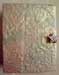 View a faux momi covered envelope book.