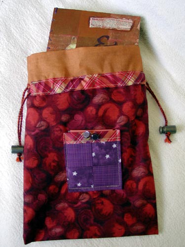 New Colors bag housing Kristi Eggplant and Pumpkin journal.