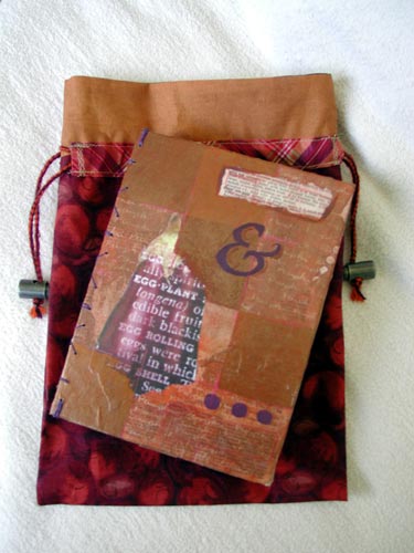 The front cover of Kristi's coptic bound Eggplant and Pumpkin New Colors journal.