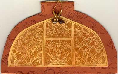 A shaped pamphlet stitch book featuring images from Ink-n-Rubber Expressions.