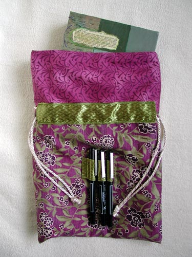 An image of the handmade bag that houses the journal.