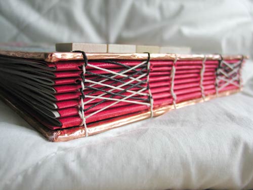This journal is hand bound to last for generations to come by using 6 individual strands of waxed linen thread and ten needles to complete.