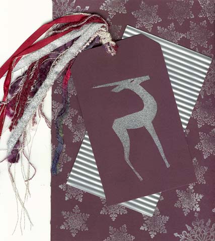 This card features non-traditional Christmas colors of purple and silver.
