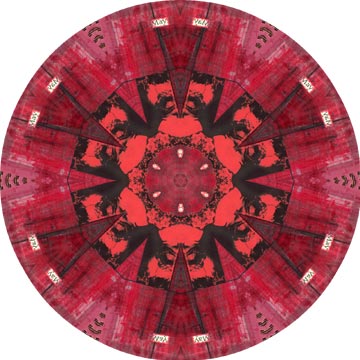 A mandala made from a mixed media altered calendar spread.