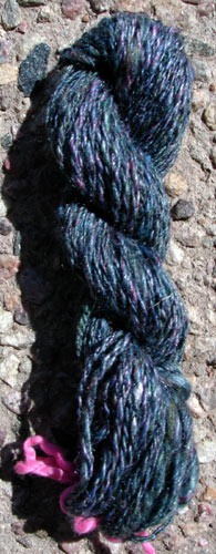 A gorgeous skein of meridon/tussah blend top spun worsted and plied to a sport weight yarn.