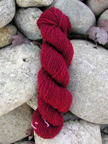 Burgundy wool from Lambspun is turned into a lovely sock yarn.