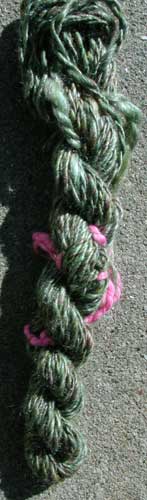 Green Ashland Bay Merino/Tussah 2-ply handspun yarn.