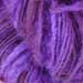Drum carded purple Lincoln woll over dyed with kool-aid.