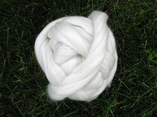 Luscious 70/20/10 merino/silk/angora blend fiber.