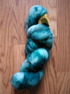 Superwash Merino roving in Emerald Forest from Traci of Bonker's Fiber.