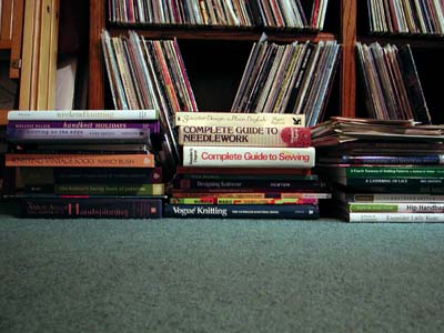 My stacks of fiber art books.