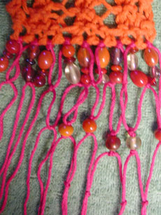 The fringe detail of the hot beads scarf.