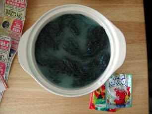 Hand spun blue Coopworth getting a Kool-Aid overdye treatment.