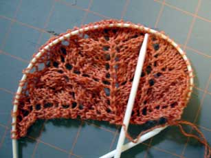 The very beginnings of Fiber Trend's Leaf Lace shawl in copper Zephyr yarn.