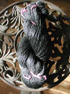 325 yds or 4 oz of washed and blocked sock weight merino/apaca/silk blend hand spun yarn