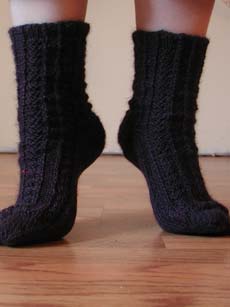 A front view of the Retro Rib worsted weight clog socks.