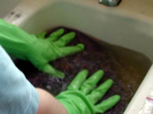 A look at pushing the wool into the water.