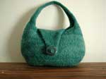 A modified Squatty Sidekick felted purse with gemstone donut closure.