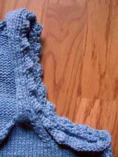 A closer look at the unblocked edging on the arm.