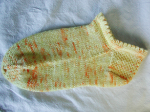 Spring Sunshine Anklet knit from hand dyed merino yarn.