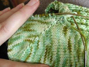 The picked up wrapped stiches that were worked from the WS.