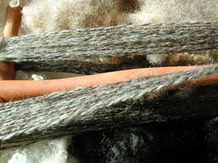 A closer look at the Wensleydale/Lincoln cross on the niddy noddy. This is before washing and setting the twist.