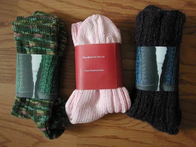 Professionally packaged hand knit socks.