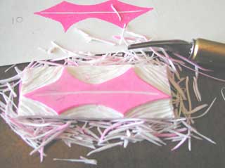 Here is the results of the carving - a nice print, a pretty stamp and a ton of shavings!