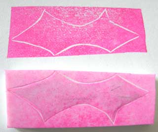See the smooth edges created when making your first cut without lifting the gouge except at sharp corners.