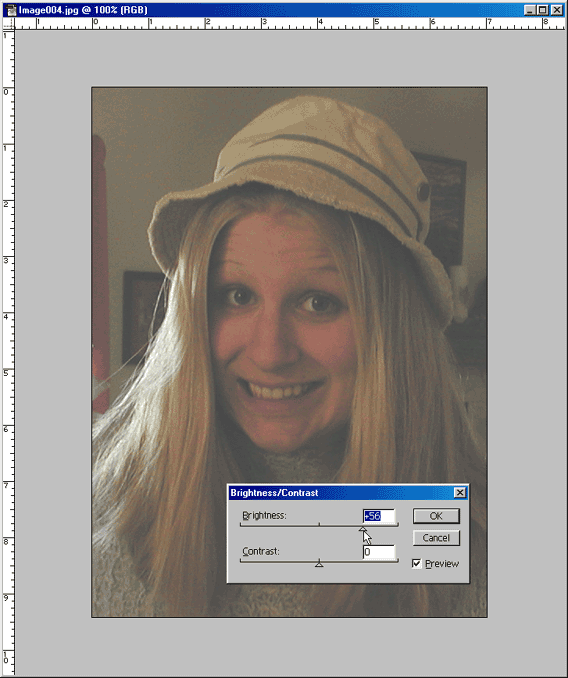 Here you can see the Brightness/Contrast dialog box for adjusting the cropped photo.