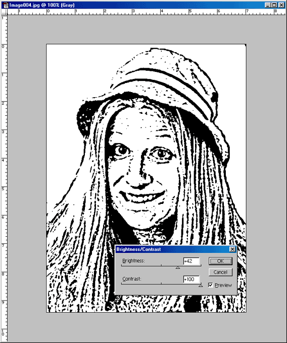 A screen shot of adjusting the brightness and contrast on the black and white  poster edged photograph.