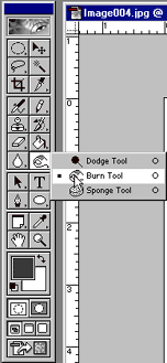 The Adobe Photoshop toolbar with the burn tool selected.